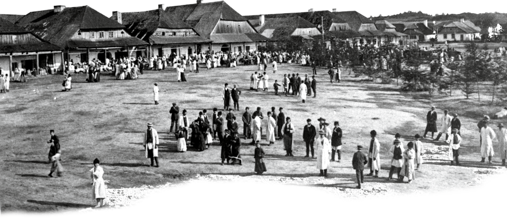 Rynek w Józefowie Biłgorajskim. Reprodukcja pocztówki z 1906 roku.